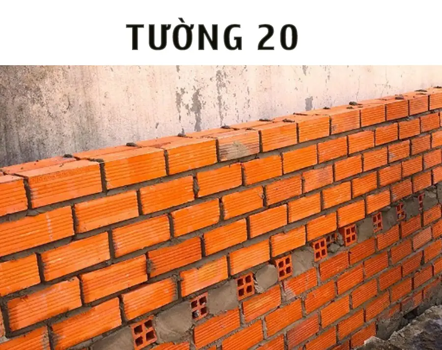 Hình ảnh cận cảnh một bức tường gạch đôi (tường 20) đang được xây dựng.